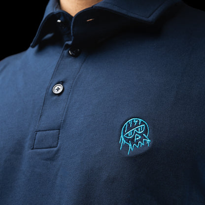 SWAG Golf x G/FORE navy men's golf polo featuring dripping SWAG skull logo over the left chest.
