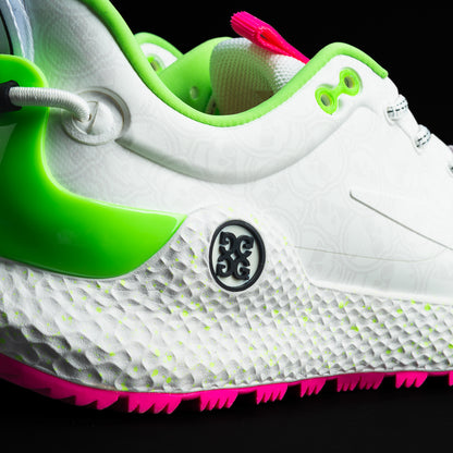 SWAG x G/FORE Men's MG4+ O2 white, neon pink, and neon green golf shoe with stacked SWAG skull design.