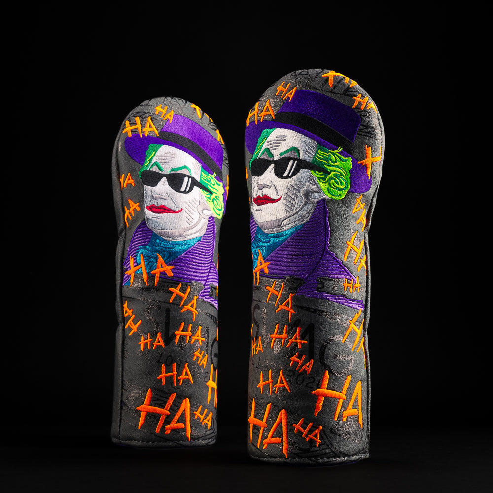 Defaced Joker Hamilton fairway headcover in black, green, purple, and blue with writing in orange.