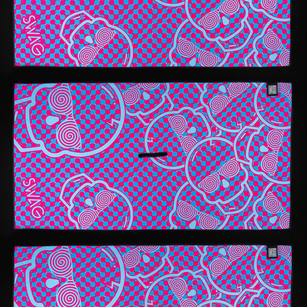 Pink and blue checkered Hypno Skull Players Towel with skull wearing glasses design.