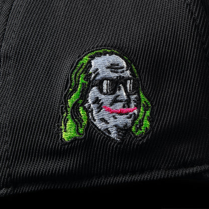 G/Fore flexfit 110 black golf cap with pink 'HAHA' text.