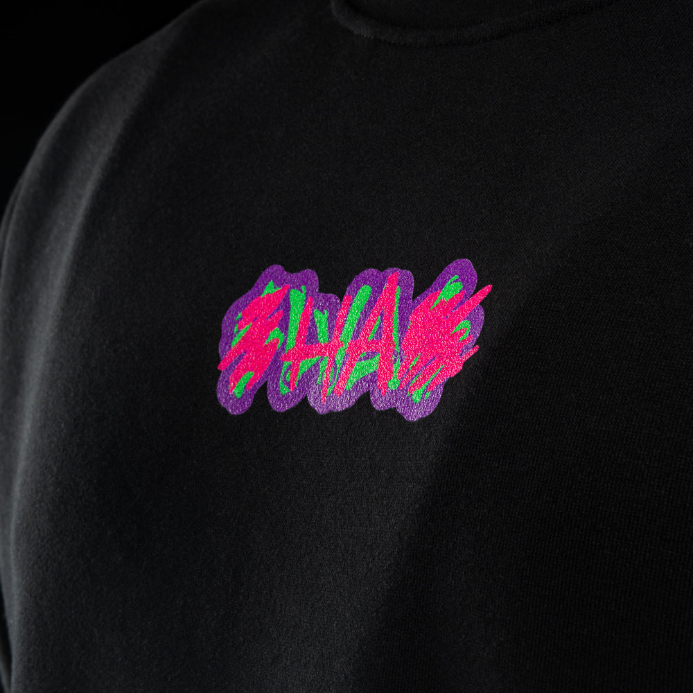 Black crewneck sweater with SWAG chest logo and neon joker skull king graphic on back.