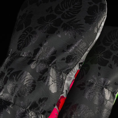 Close up shot of the Floral Skull Wood Cover Set. On a black backdrop with contrasting black florals. 