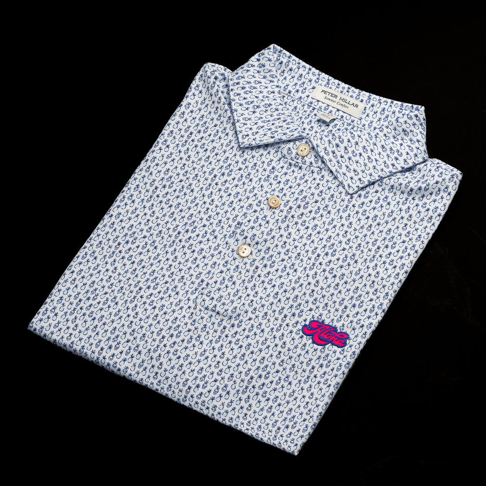 SWAG Golf x Peter Millar men's short sleeve performance golf polo shirat with pineapple print and Aloha embroidery.