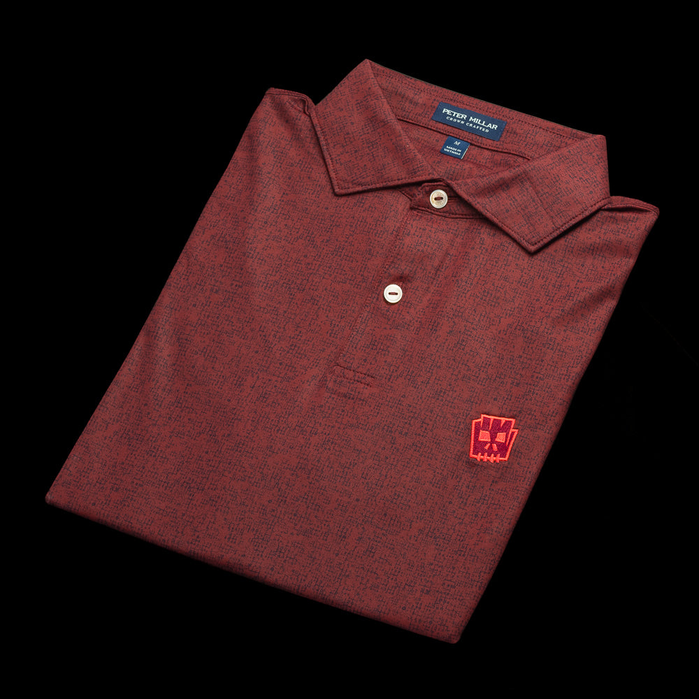 SWAG Golf x Peter Millar men's short sleeve performance golf polo shirt with tiki logo on left chest.