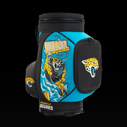 Angled view of the SWAG Golf Jacksonville Jaguars Den Caddy Cooler showcasing the "Duuuval" artwork and embroidered Jaguars logo pocket.