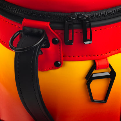 Close-up of the Kansas City Chiefs Den Caddy Cooler zipper, handle, and red and gold panels.