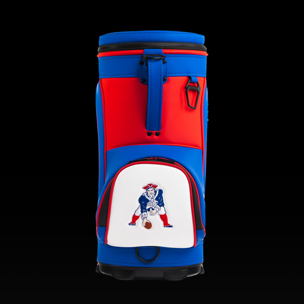 Rear view of the SWAG Golf New England Patriots Den Caddy Cooler with red, white, and blue color blocking.