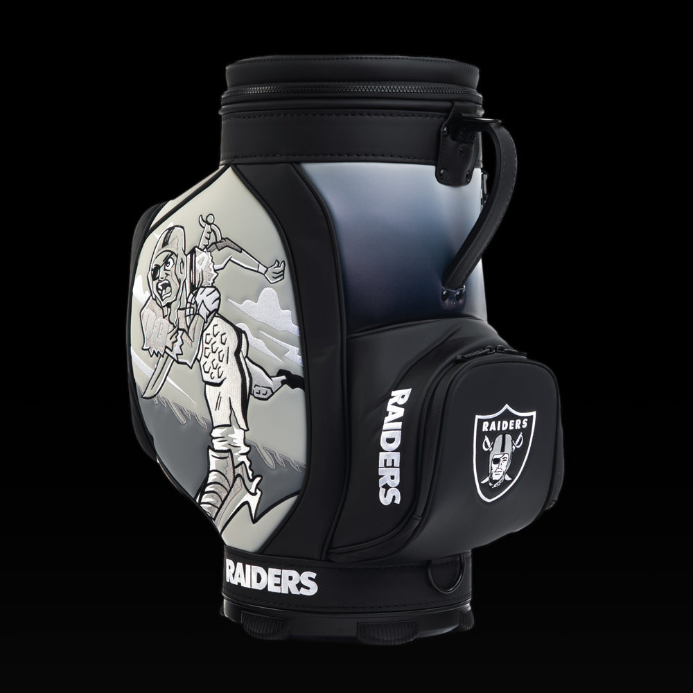 SWAG Golf Las Vegas Raiders Den Caddy Cooler featuring skeleton pirate artwork, black and silver graphics, and an embroidered Raiders logo pocket.