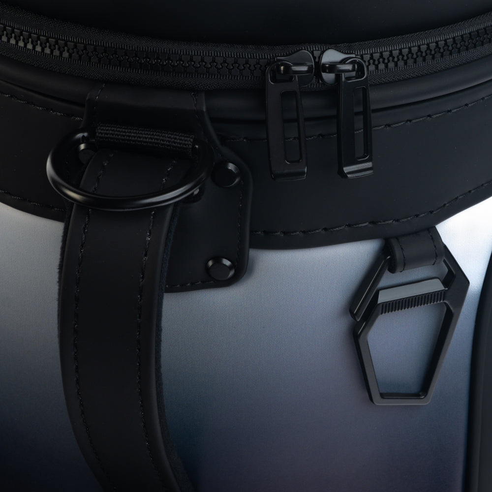 Close-up of the Las Vegas Raiders Den Caddy Cooler zipper, handle, and black and gray panels.