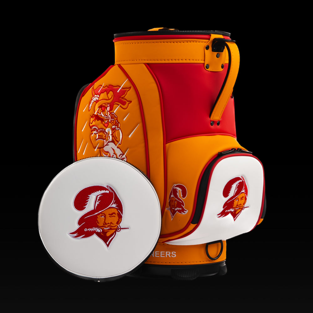 Tampa Bay Buccaneers Den Caddy Cooler displayed with the removable embroidered lid beside the cooler.