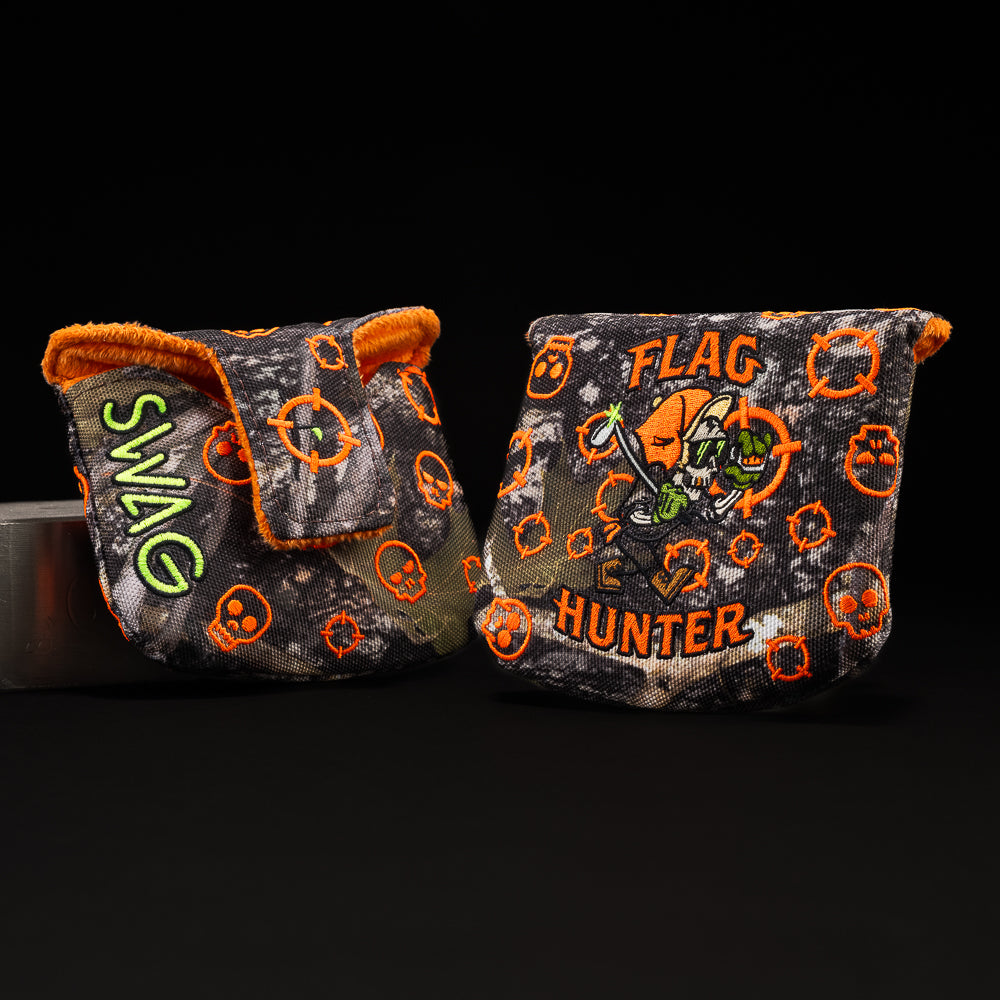 Flag Hunter camouflage mallet golf headcover with orange and green writing and skull character. 