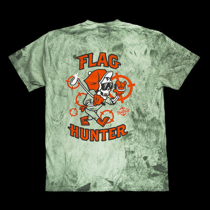 SWAG Golf green and white camouflage Flag Hunter garment dyed men's short sleeve golf T-Shirt with orange target and white flag pin on the left chest. 