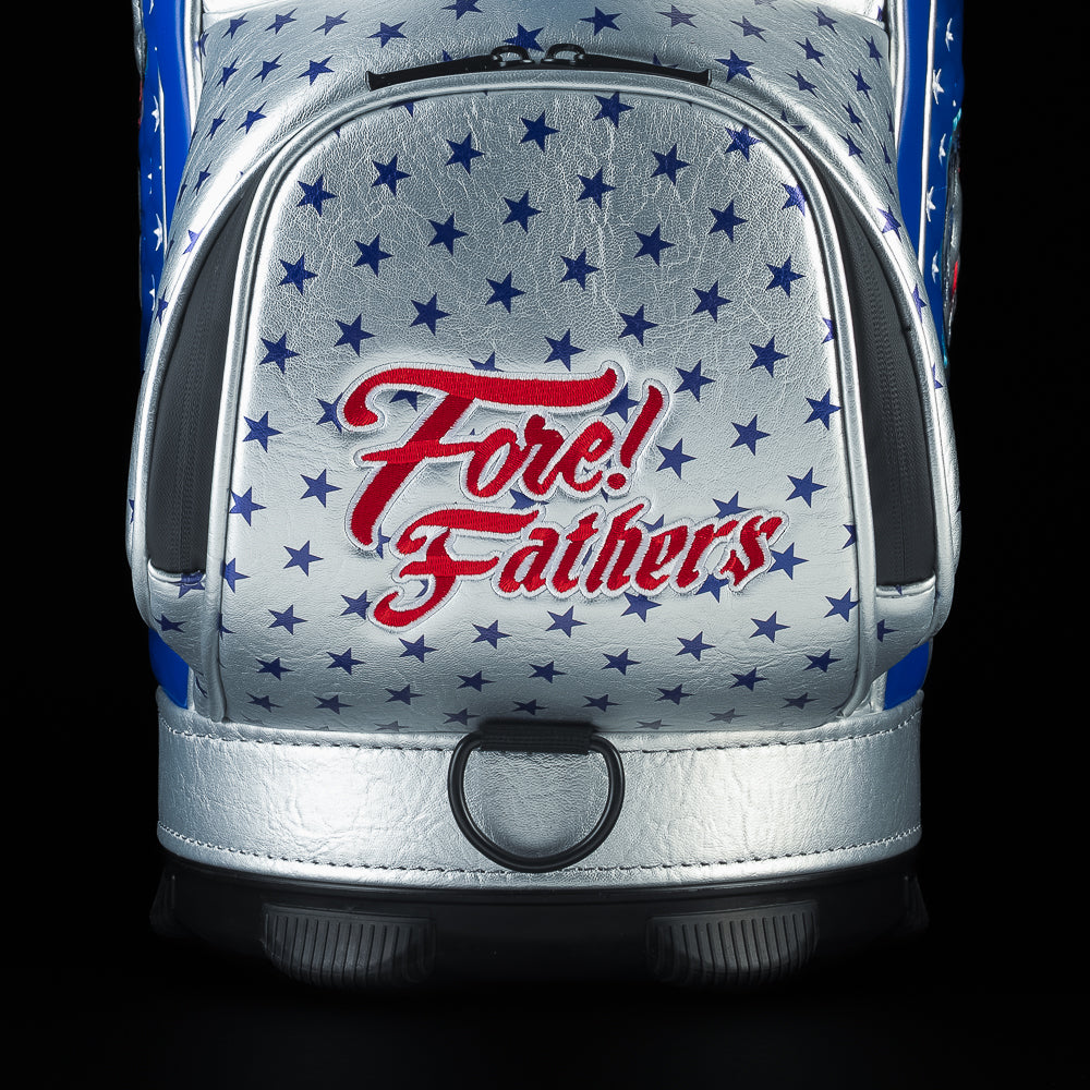 Close-up of the Fore! Fathers Den Caddy Cooler opening featuring patriotic star patterns, embroidered branding, and insulated interior lining.