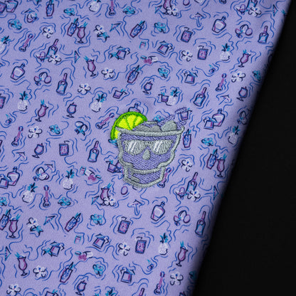 Swag x Peter Millar purple cocktail-themed men's short sleeve performance golf polo shirt.