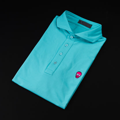 Swag x G/Fore teal men's short sleeve performance golf polo shirt.