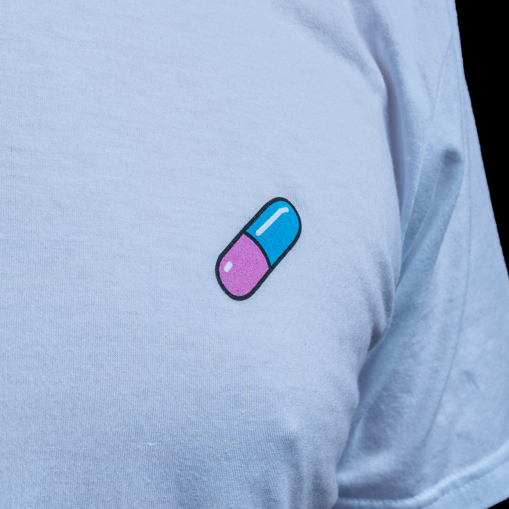 Light blue SWAG Golf Anime T-shirt featuring a small purple and blue capsule graphic on the left chest