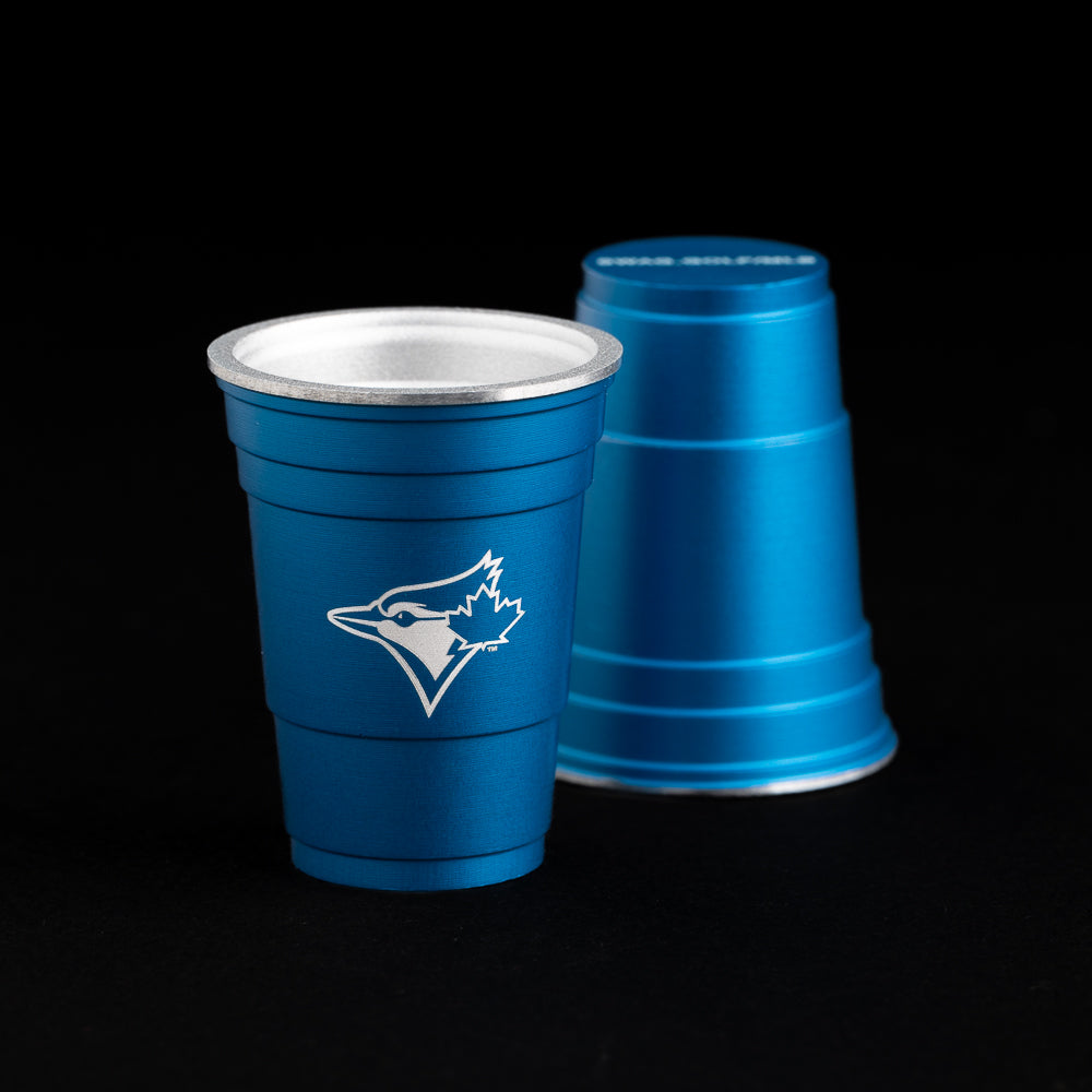 Toronto Blue jay logo on a royal blue flip cup ball marker.