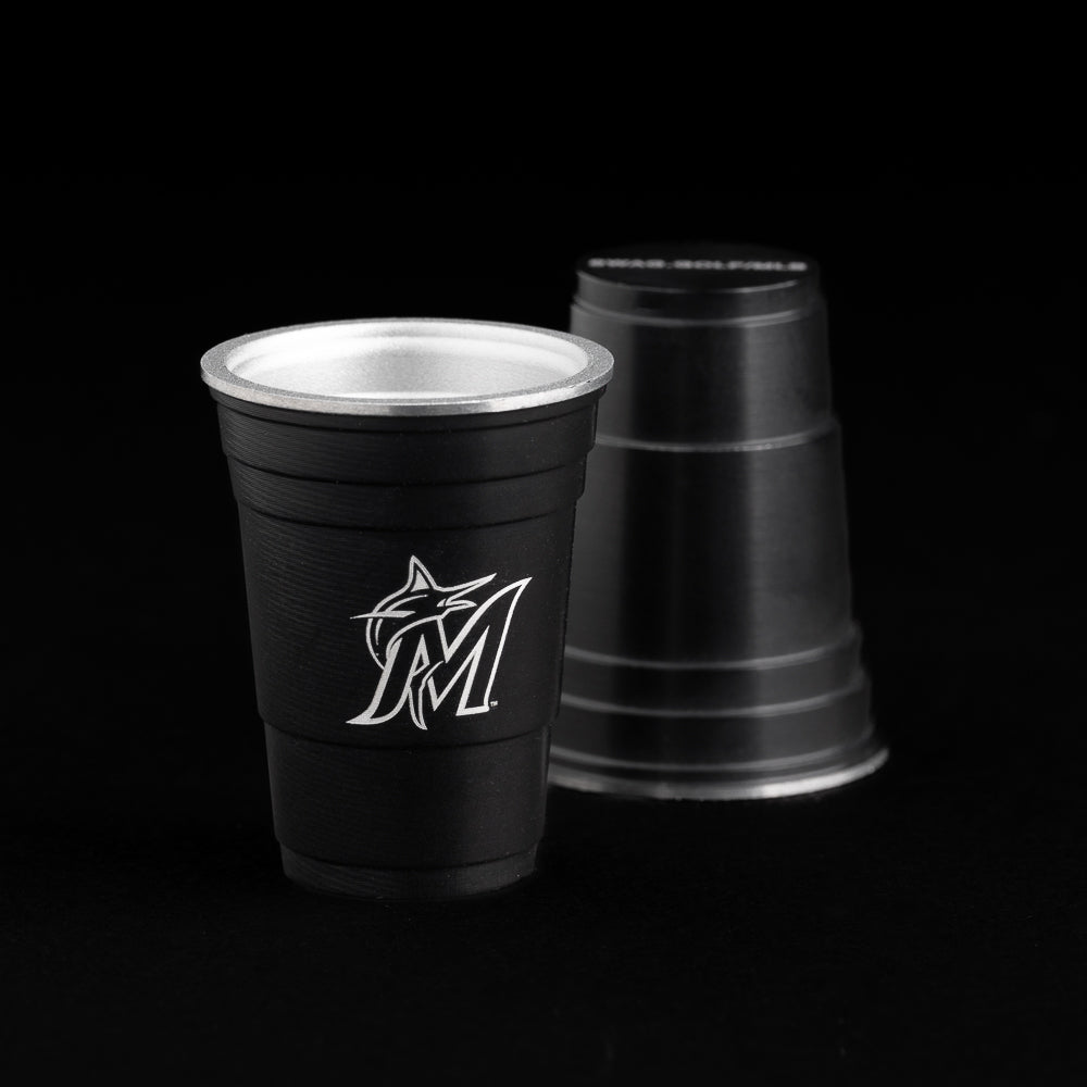 Miami Marlins logo black flip cup ball marker.