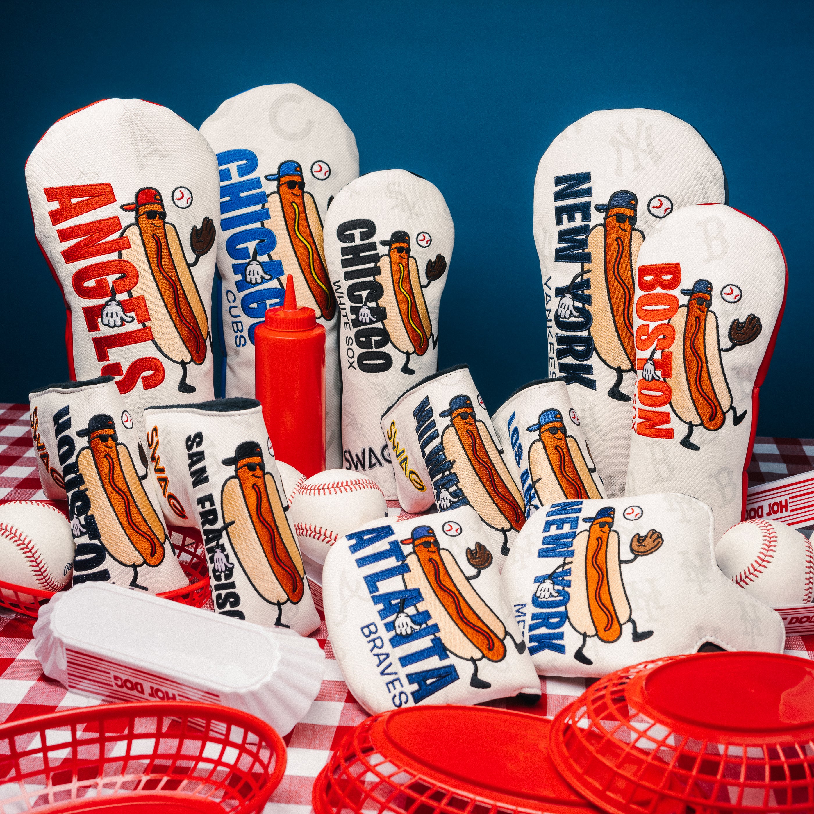 Group shot of MLB hot dog blade, mallet, driver, fairway in blue, red, white, black and navy.