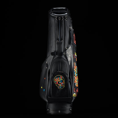 SWAG Golf x Vessel Lux Stand Bag with King playing card blackout and neon pops of color. 