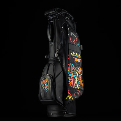 SWAG Golf x Vessel Lux Stand Bag with King playing card blackout and neon pops of color. 