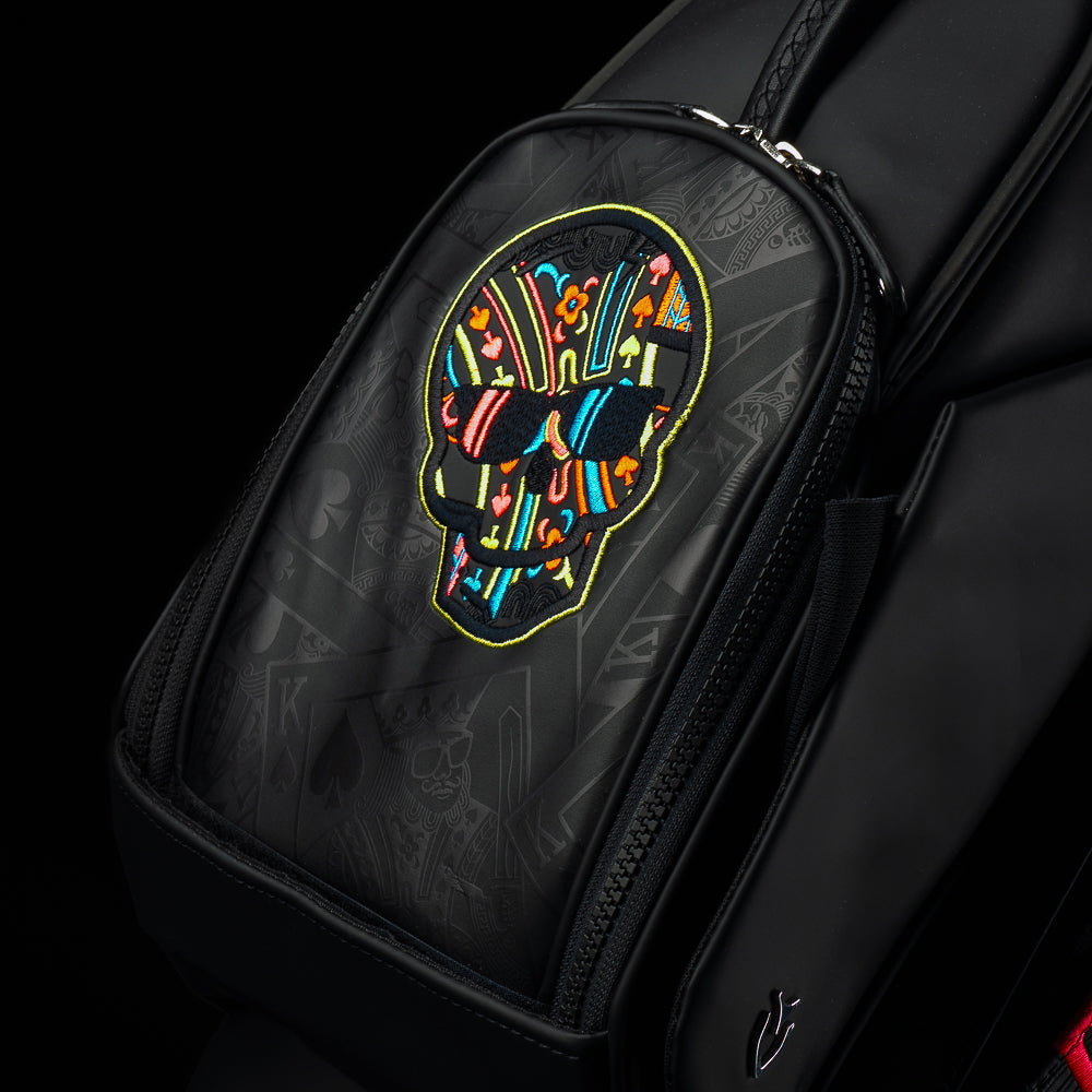 SWAG Golf x Vessel Lux Stand Bag with King playing card blackout and neon pops of color. 