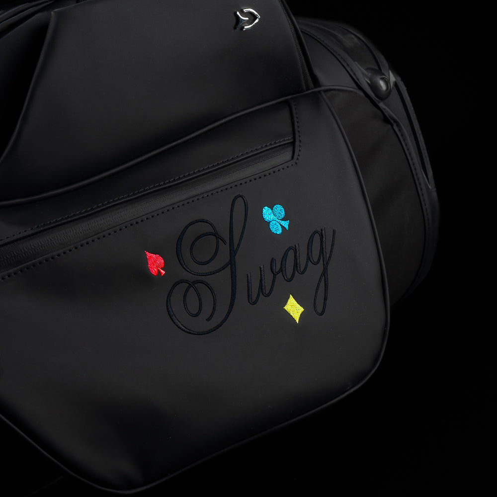 SWAG Golf x Vessel Lux Stand Bag with King playing card blackout and neon pops of color. 