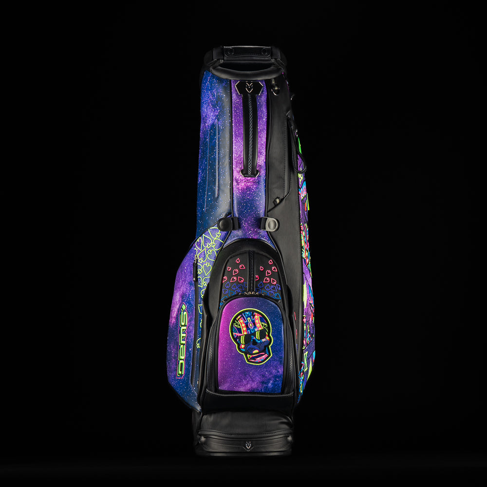 SWAG Golf x Vessel Lux Stand Bag with a purple and blue galaxy and playing card theme.