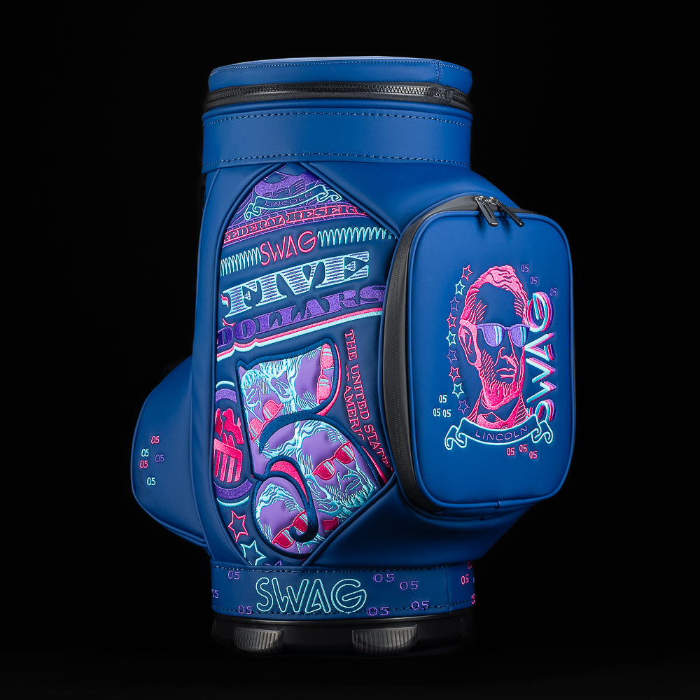 SWAG Golf navy blue golf bag zippered cooler with Abe Lincoln embroidered in neon pink and teal with $5 bill details.