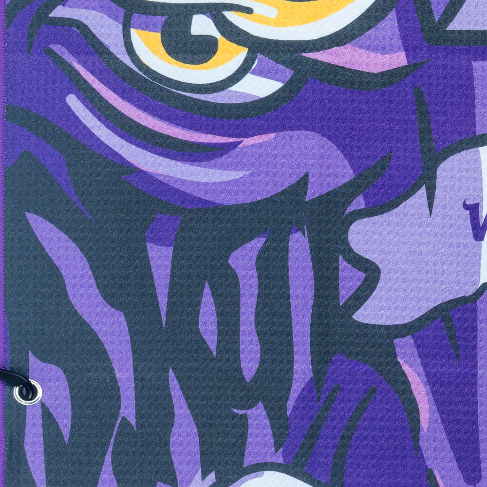NFL Minnesota Vikings purple and yellow golf towel with a cartoonish depiction of a character holding a helmet, featuring the word 'Vikings'.