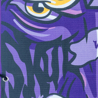 NFL Minnesota Vikings purple and yellow golf towel with a cartoonish depiction of a character holding a helmet, featuring the word 'Vikings'.
