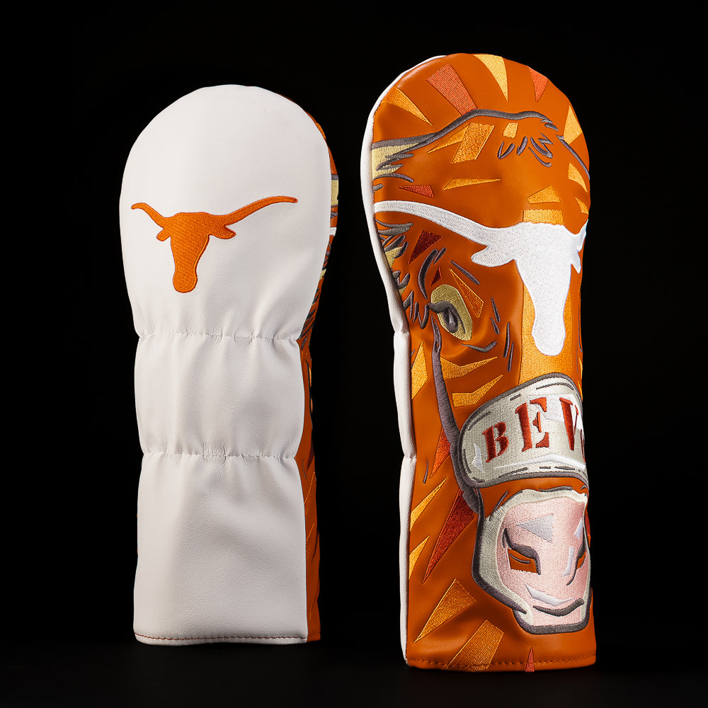 White and burnt orange University of Texas driver golf headcover featuring the Longhorn logo and bold illustrated Bevo mascot artwork.