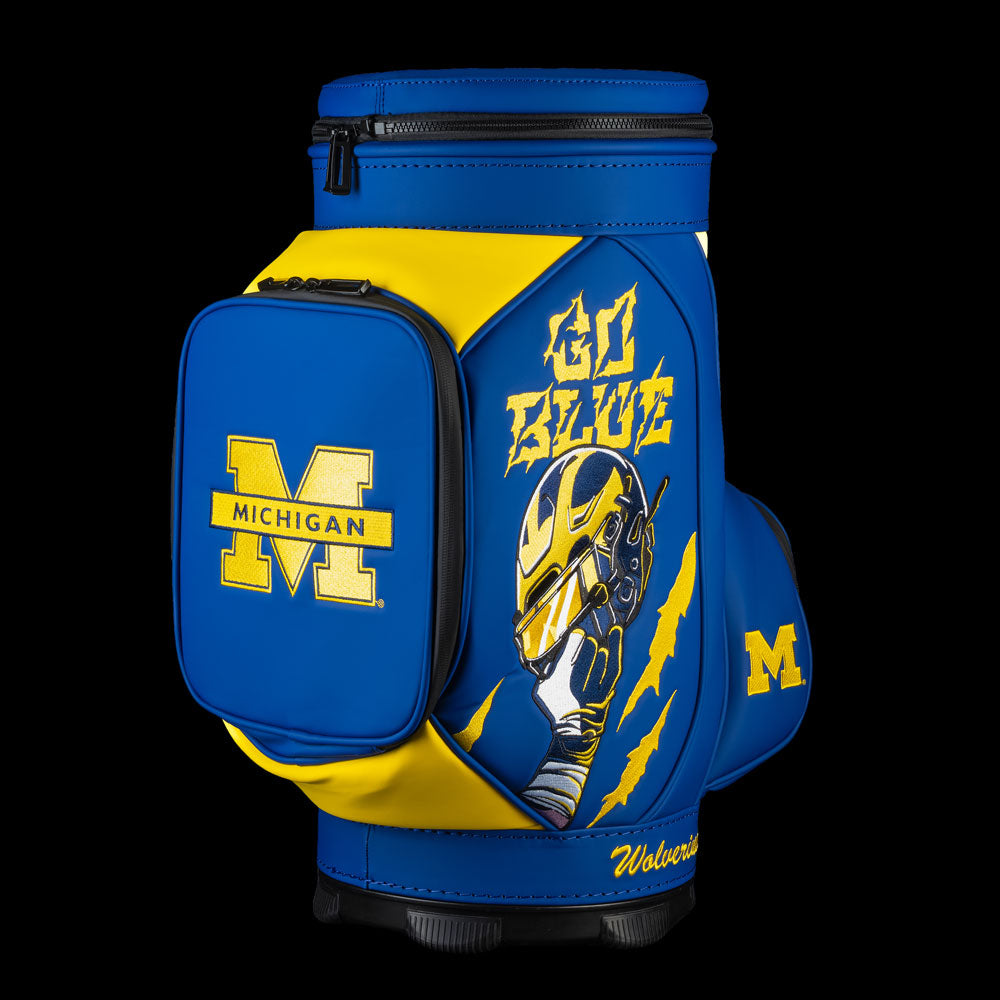 Michigan Wolverines Go Blue Den Caddy Cooler with maize claw-mark graphics, Wolverine mascot artwork, and bold blue paneling
