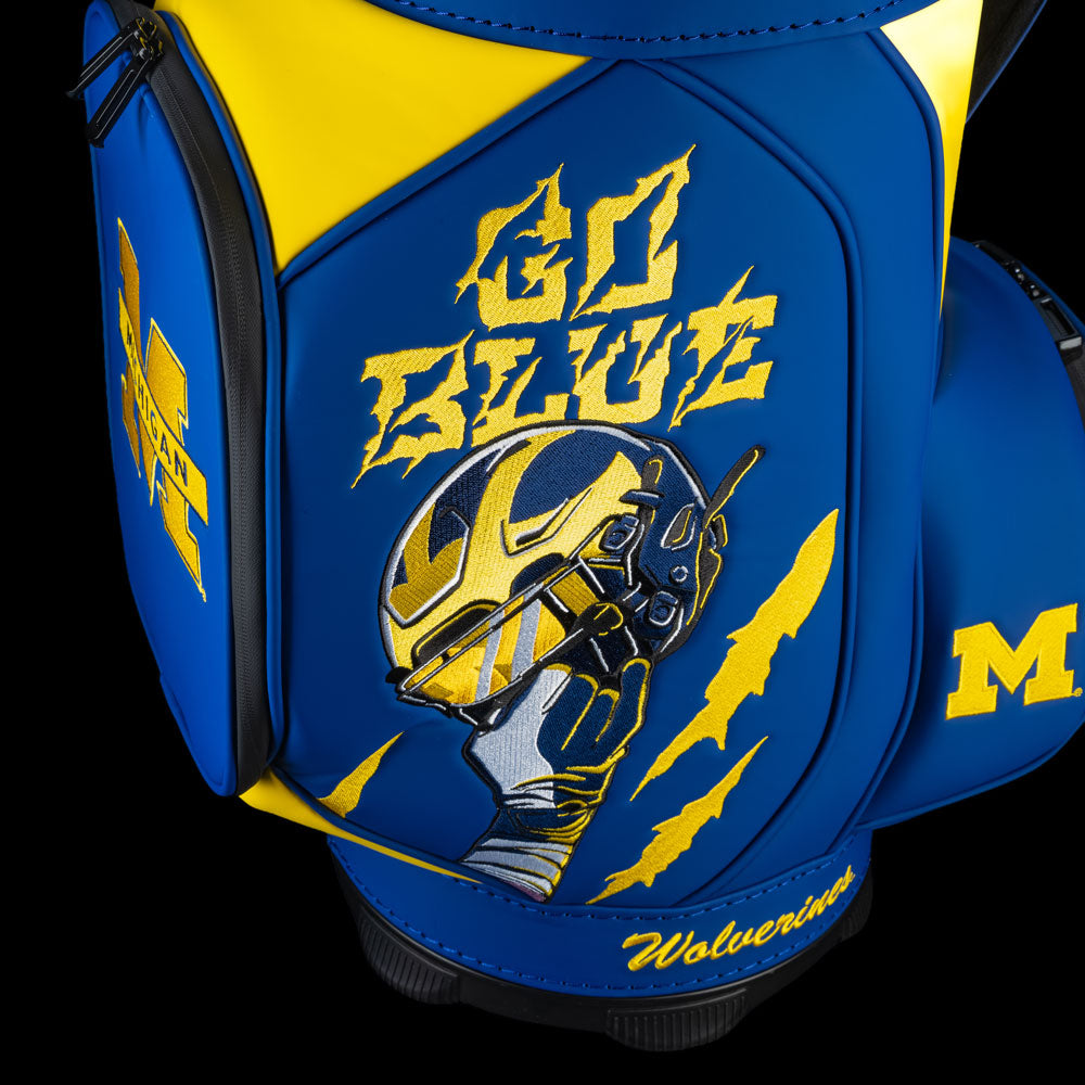 Michigan Wolverines Go Blue Den Caddy Cooler featuring Go Blue lettering, Wolverine mascot artwork, and maize claw-mark graphics