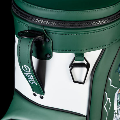 Michigan State Go Green Go White Den Caddy Cooler close-up featuring white panel, green zipper pulls, and metal bottle opener