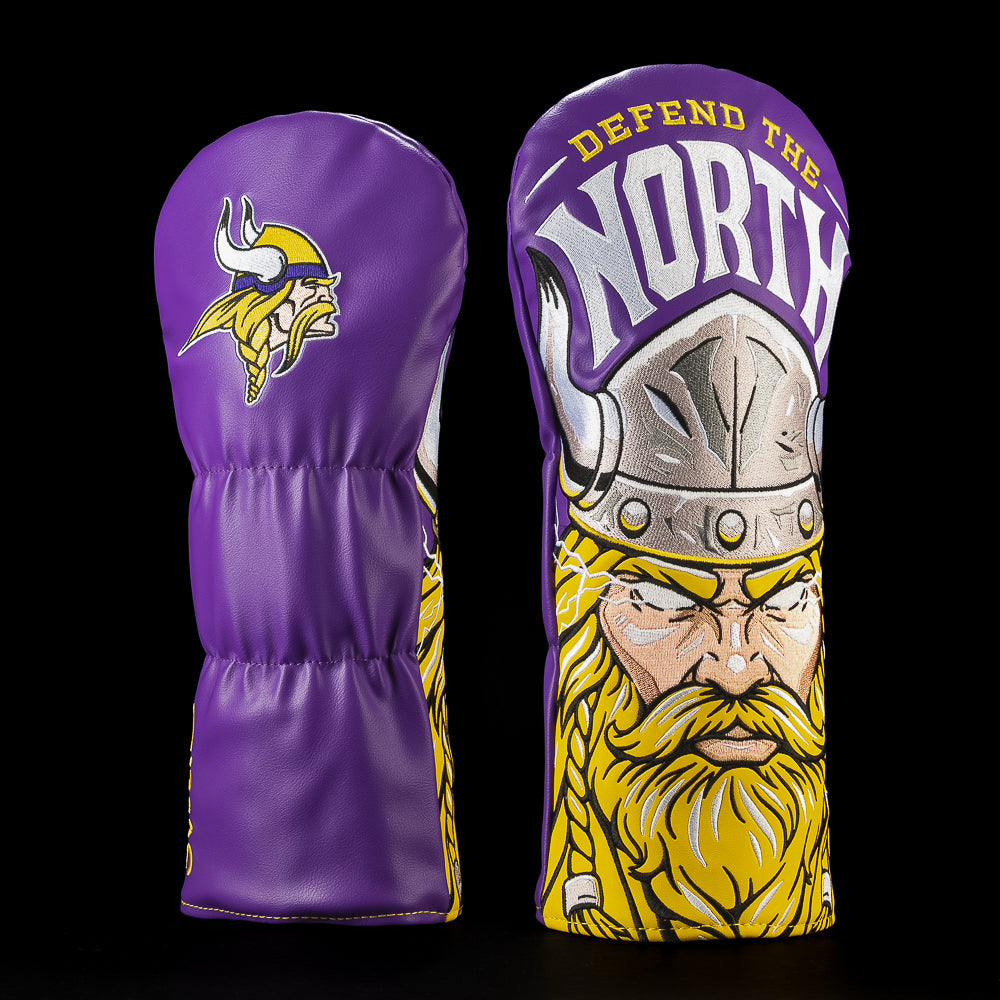 SWAG Golf NFL Minnesota Vikings Defend The North Driver Cover with a fierce Viking warrior, horned helmet, braided beard, purple and gold North lettering.