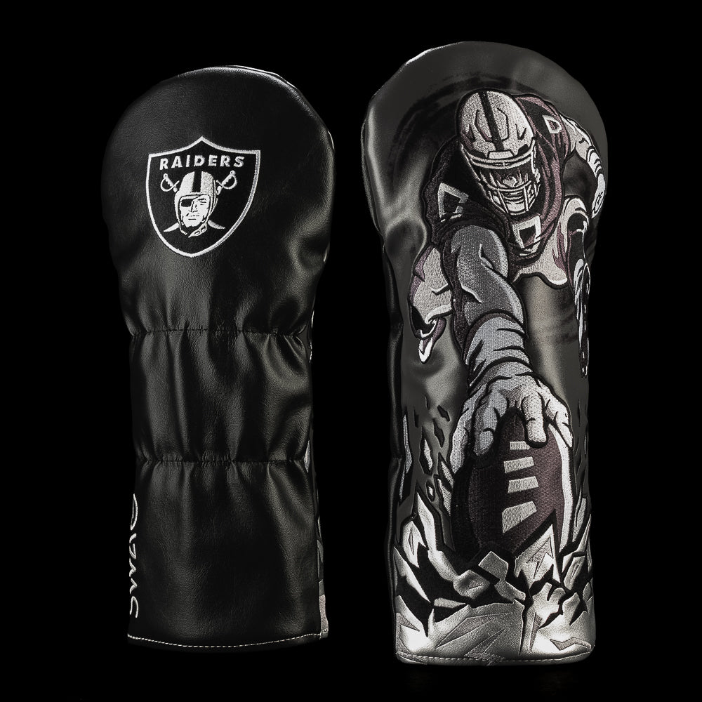 SWAG Golf NFL Las Vegas Raiders Hit The Hole Driver Cover with a helmeted football player diving toward a football breaking through the ground.