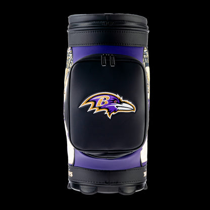 Front view of the SWAG Golf Baltimore Ravens Den Caddy Cooler featuring the embroidered Baltimore Ravens logo on the front storage pocket against a purple and black finish.