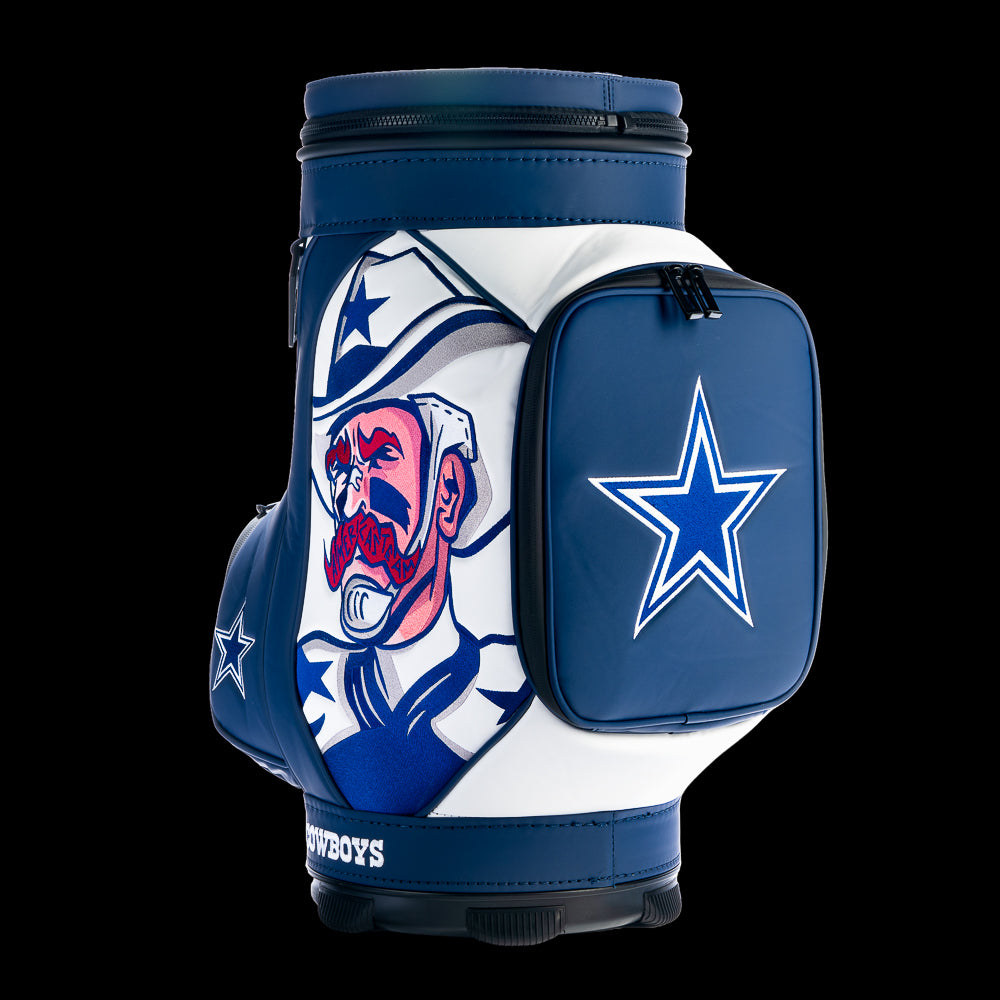 Angled view of the SWAG Golf Dallas Cowboys Den Caddy Cooler highlighting the comic-inspired Cowboys artwork, oversized star logo, and contrasting navy and white color blocking.