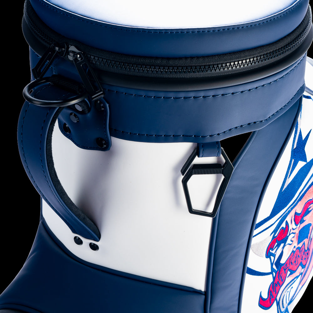 Close-up of the SWAG Golf Dallas Cowboys Den Caddy Cooler featuring premium zipper hardware, stitched leather trim, navy top panel, and carry handle.