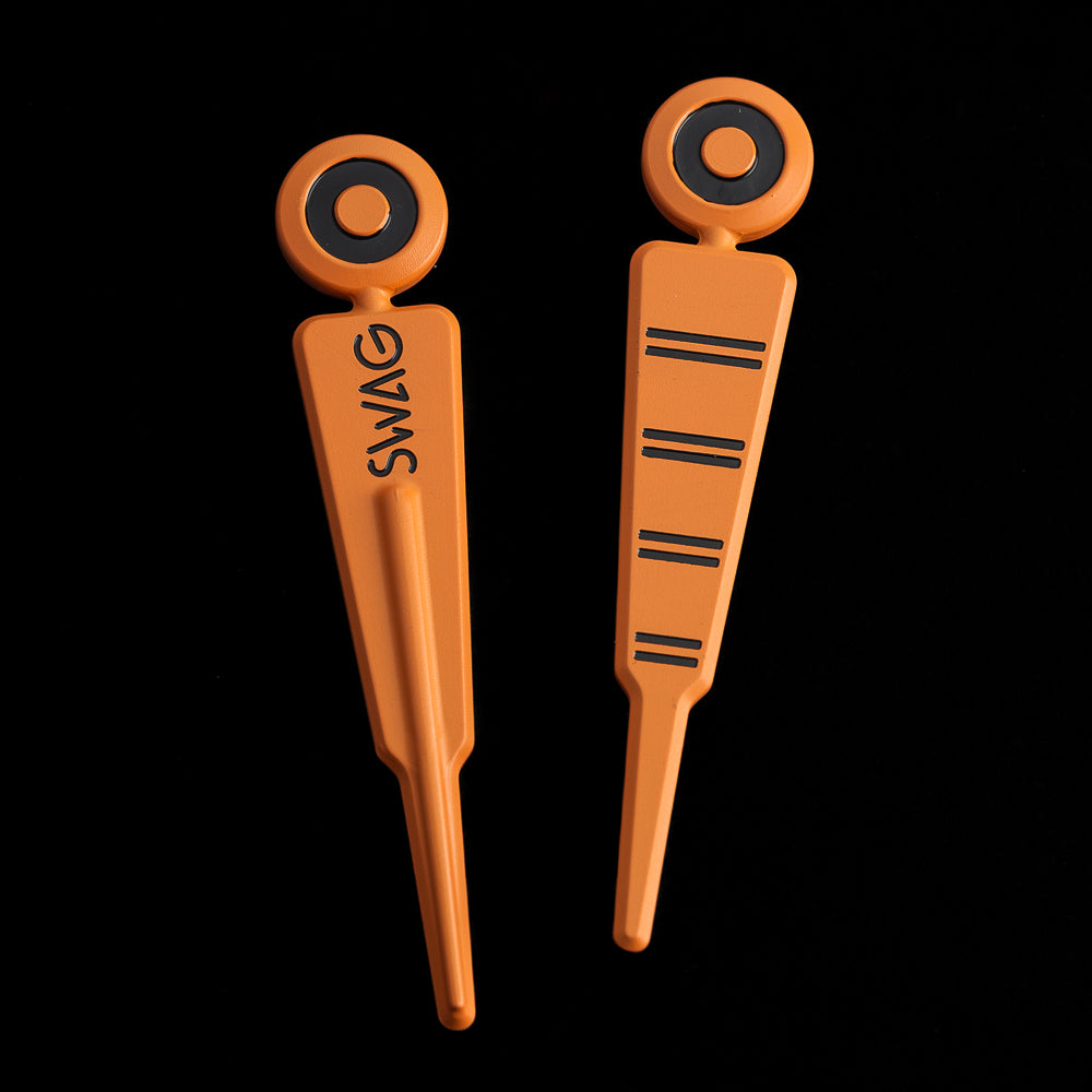 SWAG Golf down marker orange and black stainless steel golf divot tool.