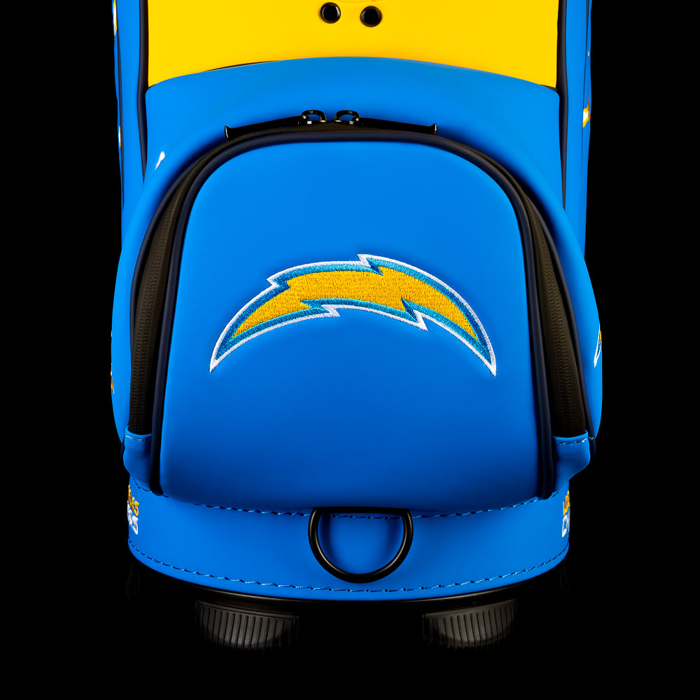 Close-up view of the SWAG Golf Los Angeles Chargers Den Caddy Cooler with an embroidered Chargers logo on the front pocket.