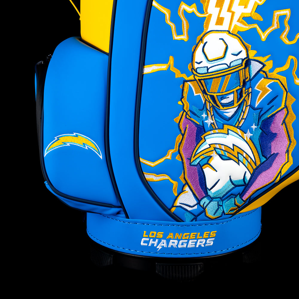 Close-up of the embroidered Chargers logo on the front pocket with the lightning-themed artwork in the background.