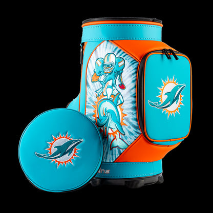 Miami Dolphins Den Caddy Cooler displayed with the removable embroidered lid beside the cooler.