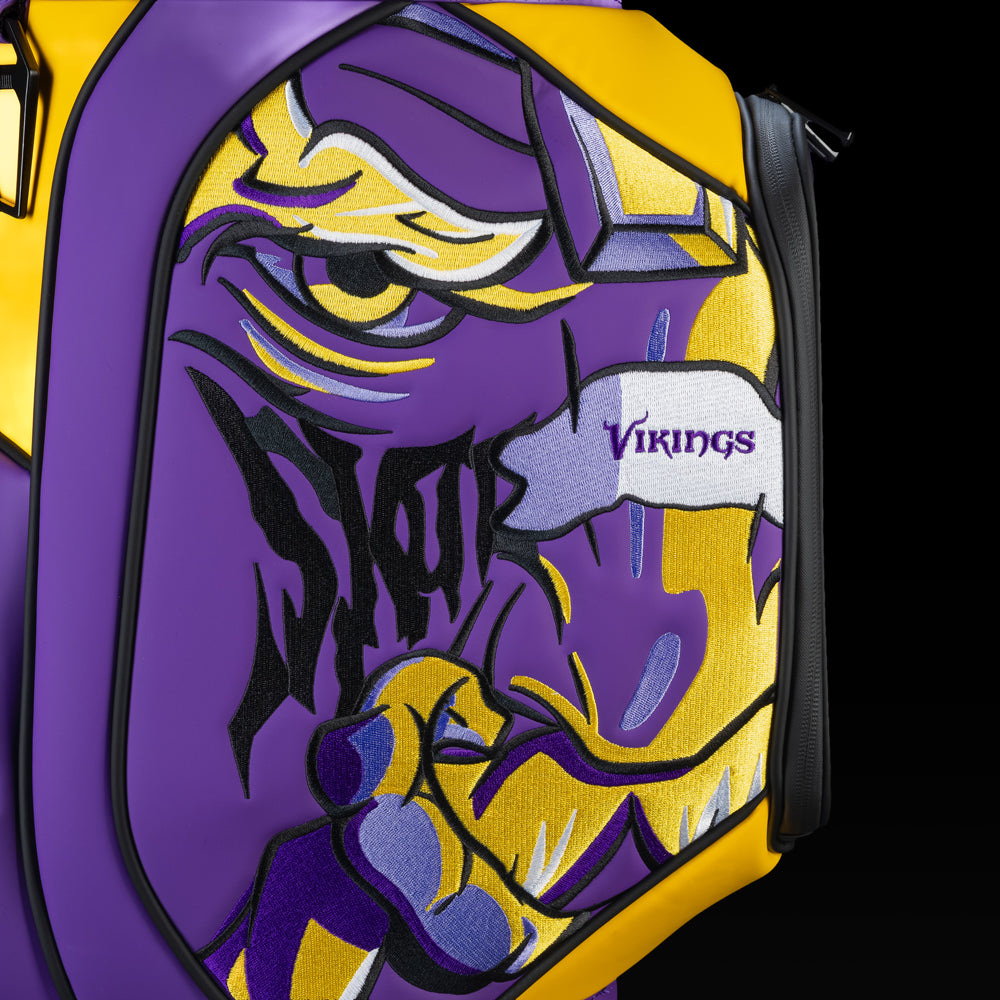 Close-up of the Viking warrior artwork and bold purple and gold graphics.