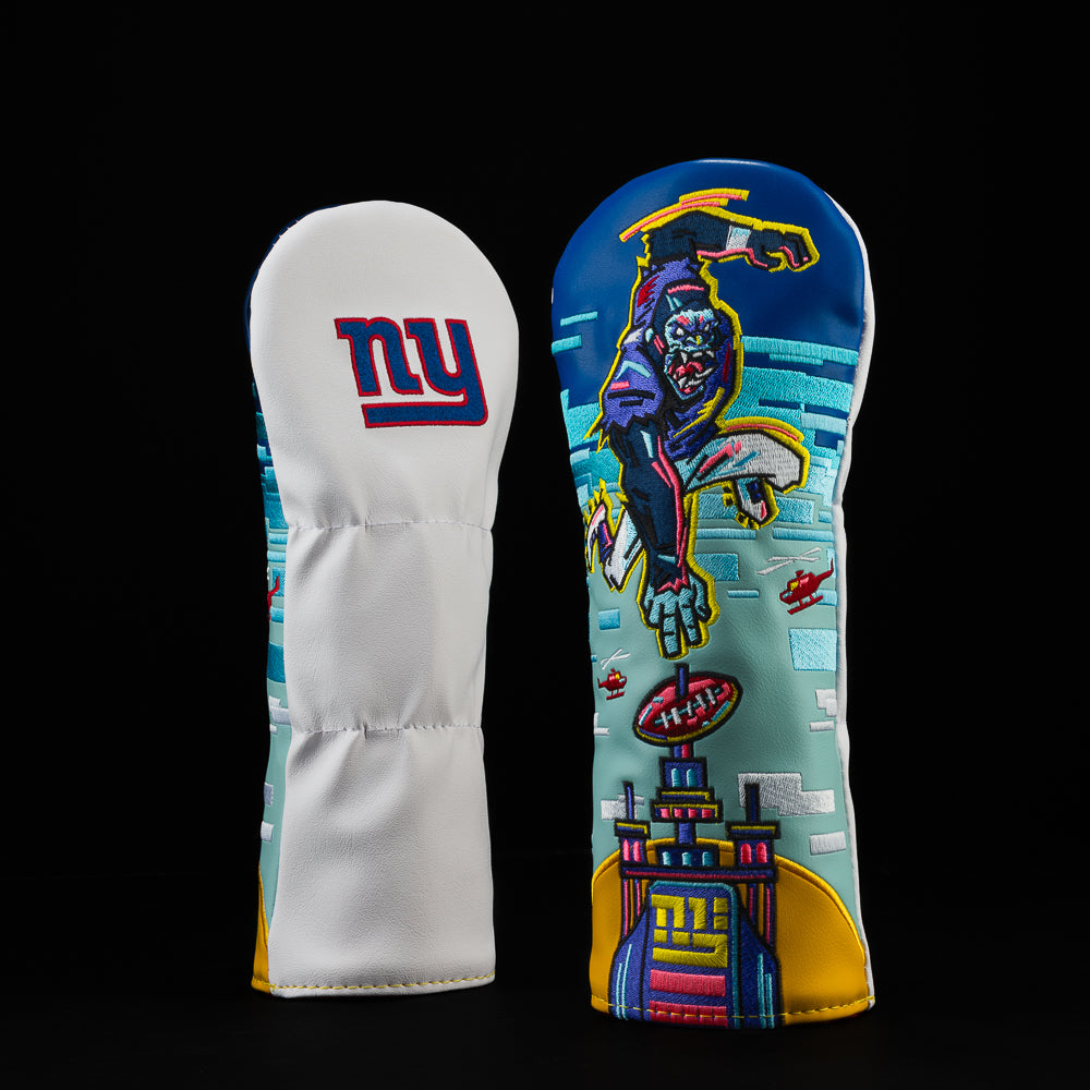 NY Giants fairway cover with a character jumping over a skyscraper. 