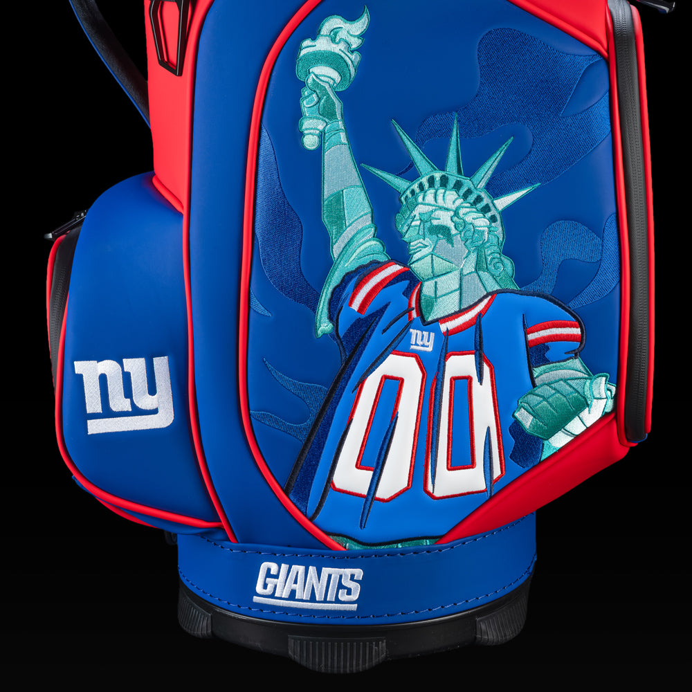 Close-up of the embroidered Giants logo on the front pocket with the Statue of Liberty artwork in the background.