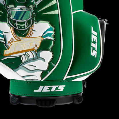 Close-up of the embroidered Jets logo on the front pocket with the football artwork in the background.