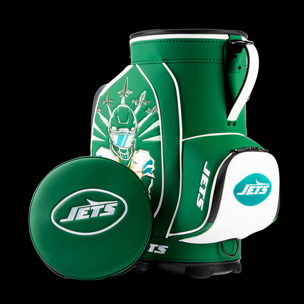 New York Jets Den Caddy Cooler displayed with the removable embroidered lid beside the cooler.